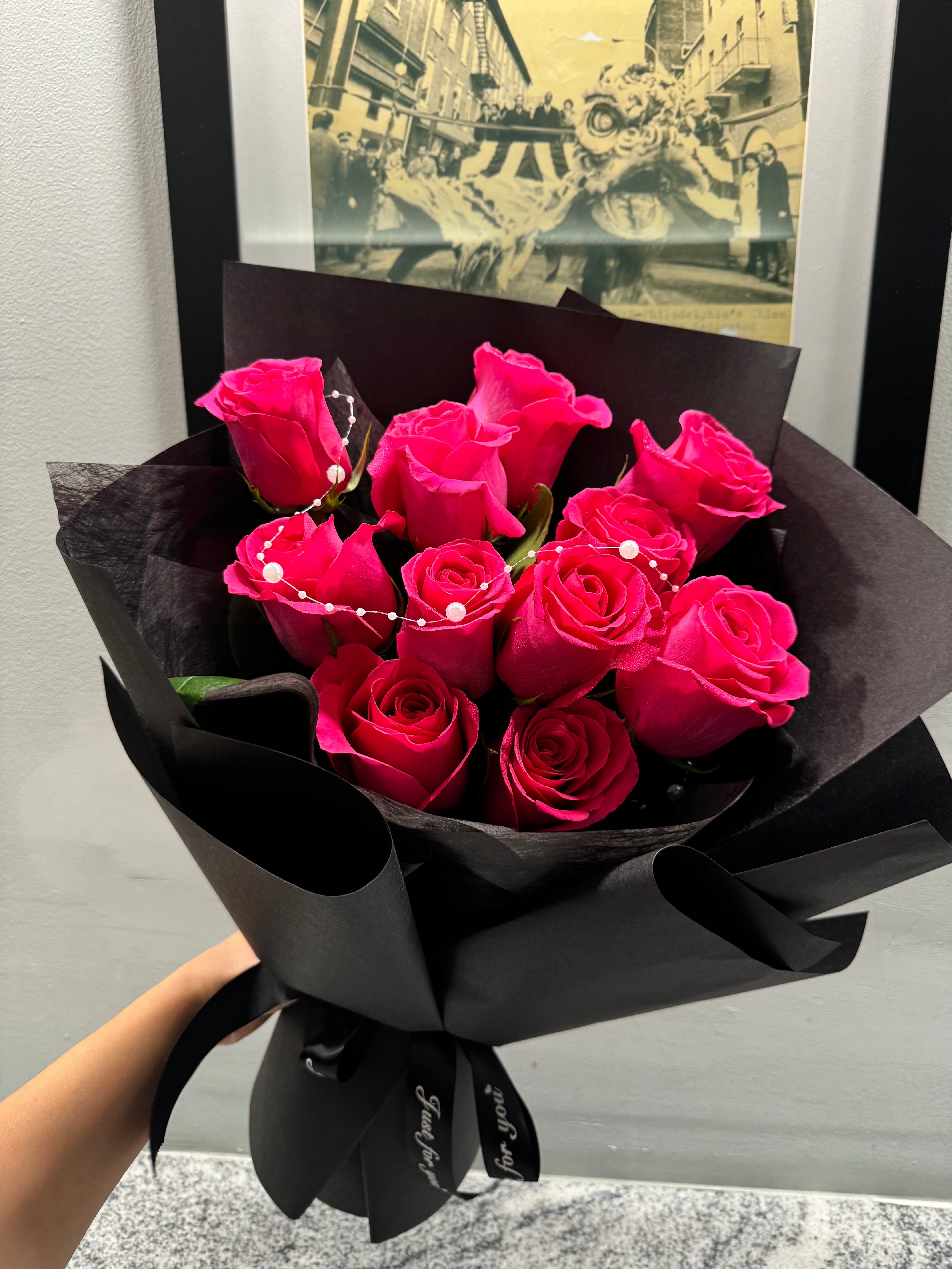 12 st hot pink rose wrap with black paper – Rising Garden